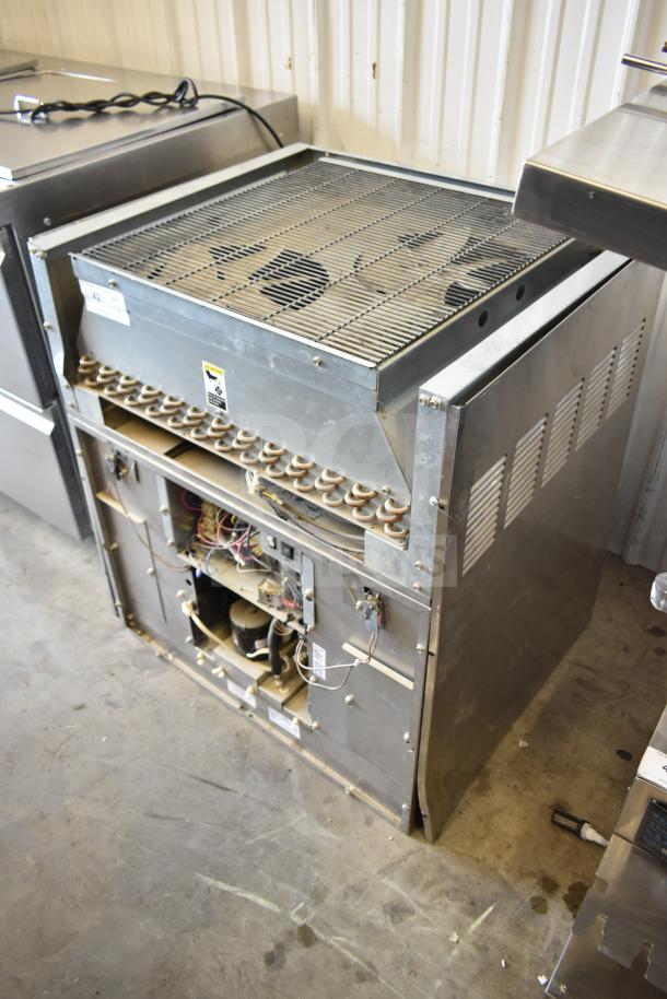 Ice-O-Matic ICE1506HT1 Slimline Ice Machine, 30", top air discharge, 1430 lb. capacity, 208-230V, 1 Phase, metallic finish, visible components.