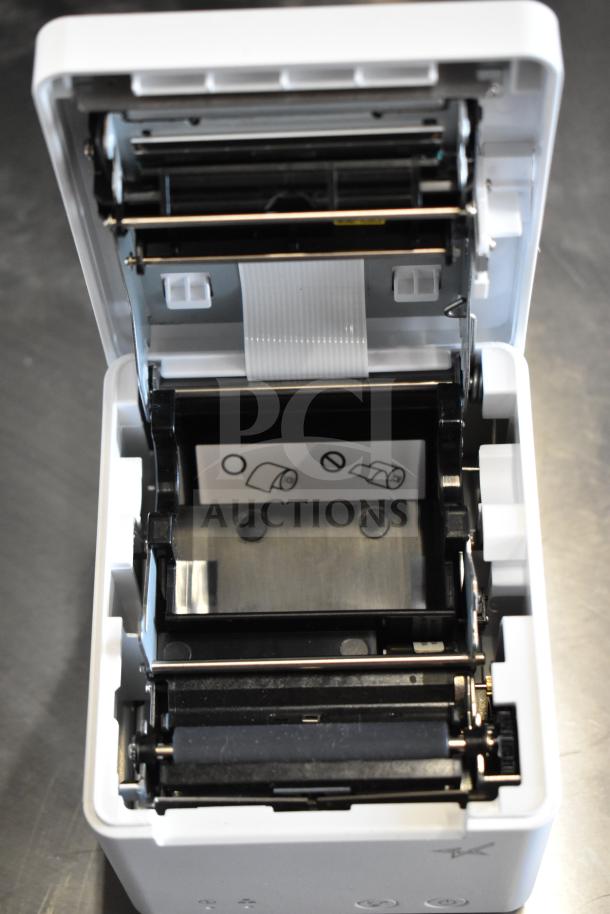 C-Print2 MCP20 WT US Receipt Printer, open view, showcasing roller mechanism and receipt loading instructions, pristine condition.