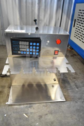 6 Head Electric Automatic Liquid Filling Machine, stainless steel, digital control panel, good condition, for bags and bottles.