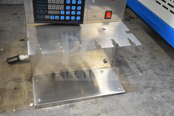 6 Head Electric Automatic Liquid Filling Machine with digital display, stainless steel construction, in good condition.