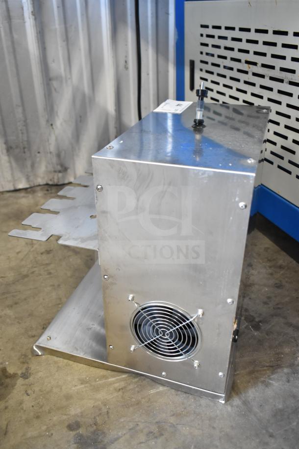 6 Head Electric Automatic Liquid Filling Machine for stand-up bags and bottles, stainless steel, in good condition.