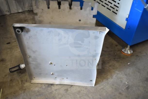 6-Head Electric Automatic Liquid Filling Machine for stand-up bags and bottles, featuring durable metal construction. Signs of wear visible.