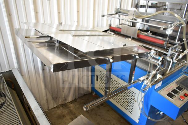 Commercial floor paper tube labeling machine on casters, 208/240V, 1 phase. Features metal construction and digital controls.