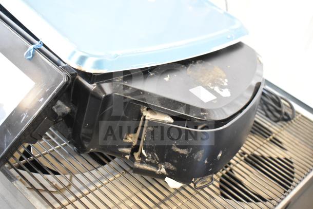 2018 Hobart HTi-7LH26 commercial scale, tested and working. Scratch marks and wear visible. Model and voltage labels present.