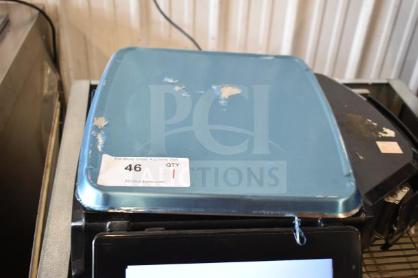 2018 Hobart HTi-7LH26 commercial countertop scale, tested and working. Blue platform with visible wear. Auction tag reads "46 QTY 1".