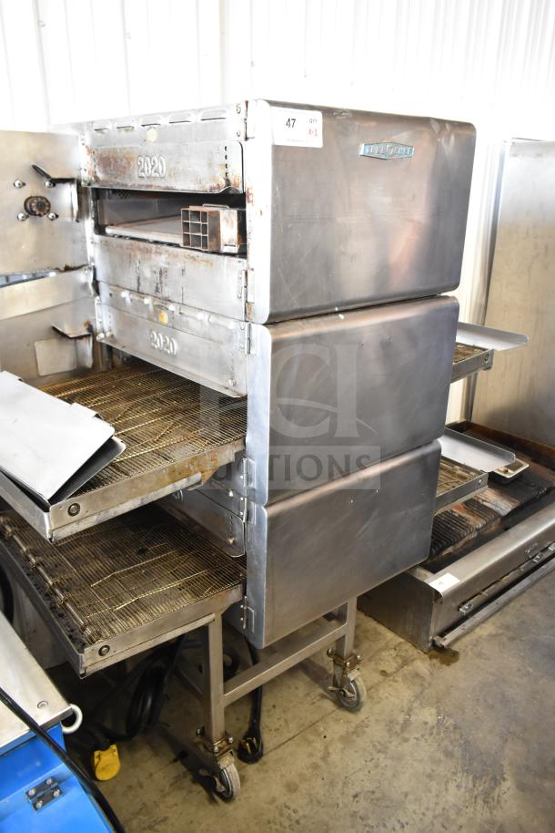 Turbochef HhC2020 commercial rapid cook oven, electric conveyor, 208/240V, 3-phase, with equipment stand on casters.