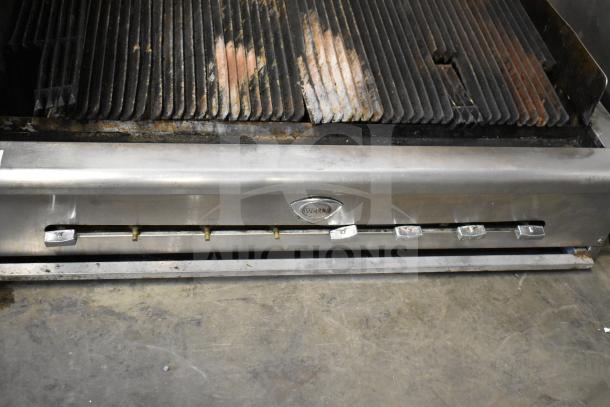 Wells Commercial Gas Charbroiler Grill, stainless steel, countertop model, visible wear, brand logo on front panel.
