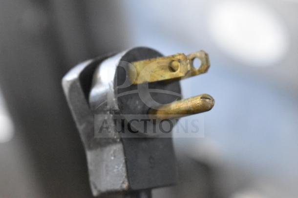 A 3-prong electrical plug for Beverage Air equipment, indicating 115 volts, 1 phase power requirement.