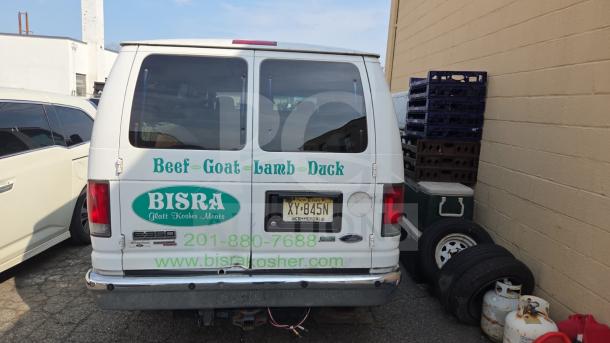 White Ford E350 van, rear view, with "BISRA Glatt Kosher Meats" branding. License plate: New Jersey XY-845N. Commercial use.