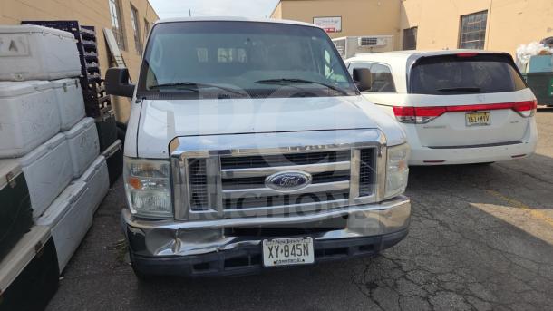Ford E350 Van, white, visible front view, clean condition, New Jersey commercial license plate XY-845N.