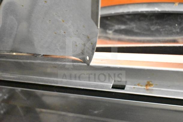 Turbo Air PST-28-12-D2-N prep table, metal surface detail, visible wear marks. 115V, 1 Phase.