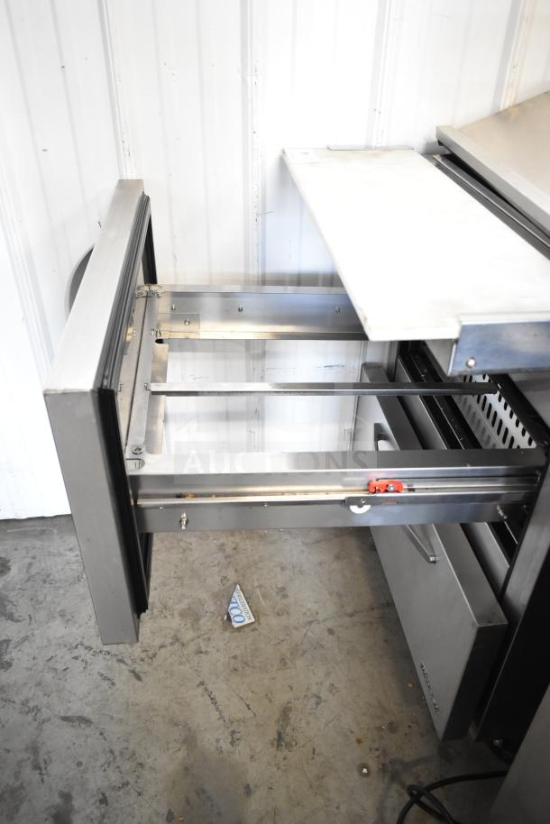 Turbo Air PST-28-12-D2-N prep table with 2 drawers open, stainless steel, 115V, 1 Phase; commercial kitchen use.