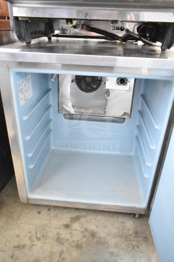 Delfield 406-STAR2 commercial undercounter cooler, single door, 115V, 1 phase, interior fan, visible label, stainless steel.