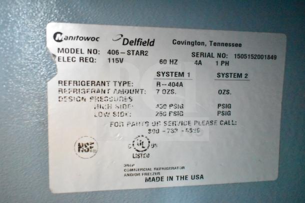 Delfield 406-STAR2 undercounter cooler label showing model, refrigerant type R-404A, 115V, and pressure specifications.