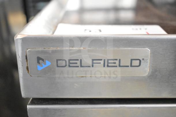 2021 Delfield F2973CP Chef Base, stainless steel, 4 drawers, 115V, 1 phase, visible Delfield branding.