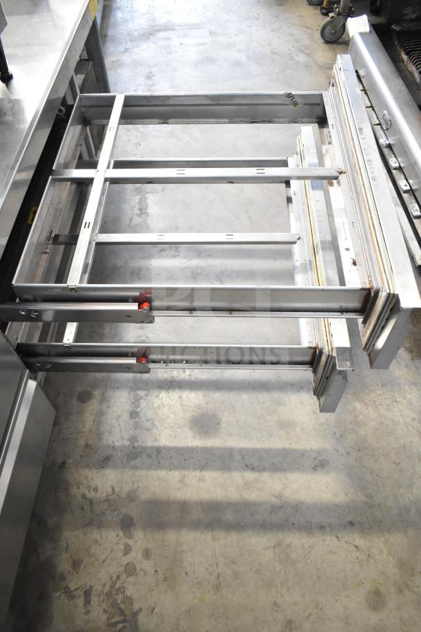 2021 Delfield F2973CP Commercial 4 Drawer Chef Base, stainless steel, 115V, 1 phase, open drawers shown, good condition.