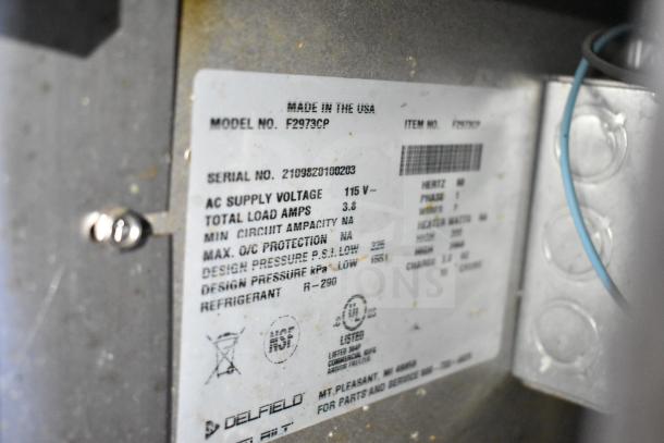 2021 Delfield F2973CP Commercial Chef Base label showing 115V voltage, 1-phase, made in USA. Serial: 2109820100203.