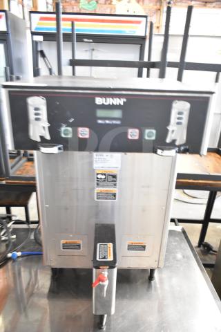 Bunn DUAL TF DBC commercial dual coffee machine with hot water dispenser. Stainless steel finish, visible control panel.
