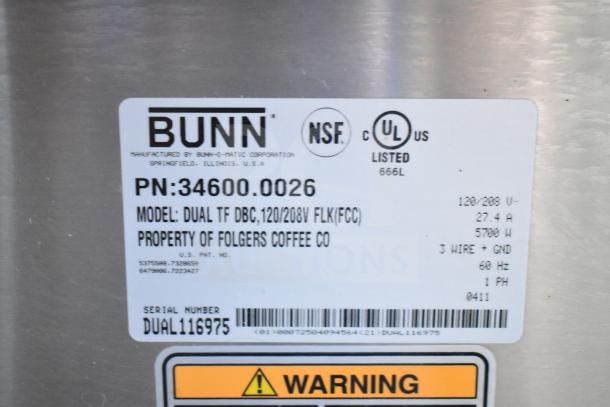 Bunn DUAL TF DBC coffee machine label, model number, voltage, and property details.