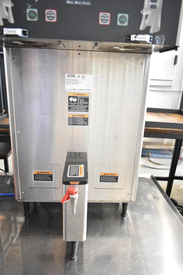 Bunn DUAL TF DBC commercial coffee machine with dual brewing and hot water dispenser, 120/208V, 1 Phase. Visible labels display model and warnings.