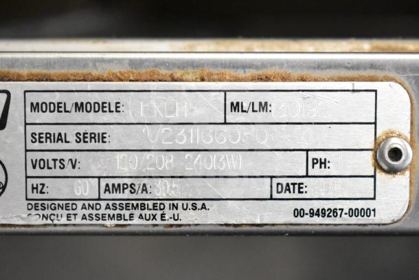 Hobart LXLH commercial undercounter dishwasher label showing model, serial number, and voltage information.