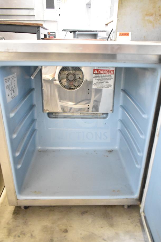2017 Delfield 406P-STAR2 undercounter cooler, single door, commercial, 115V, 1 phase, interior view with fan, labels visible.