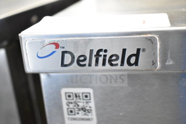2016 Delfield UC4048P-STAR 2-door undercounter cooler, stainless steel, 115V, 1 phase, commercial use, logo visible.