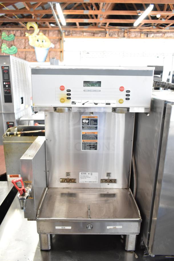 Bunn DUAL SH DBC commercial countertop double coffee machine with hot water dispenser, visible warning labels, 120/208V, 1 phase.