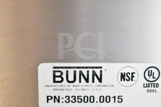 Bunn DUAL SH DBC coffee machine label showing model, NSF, UL listed, part number 33500.0015, and manufacturer details.