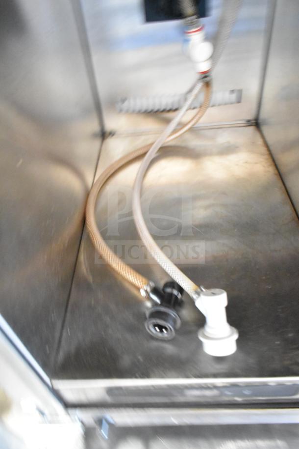 Stainless steel interior of Automatic Bar Controls JT-NITCOM-L Nitro Dispenser, showing hoses and fittings. 2023 model.