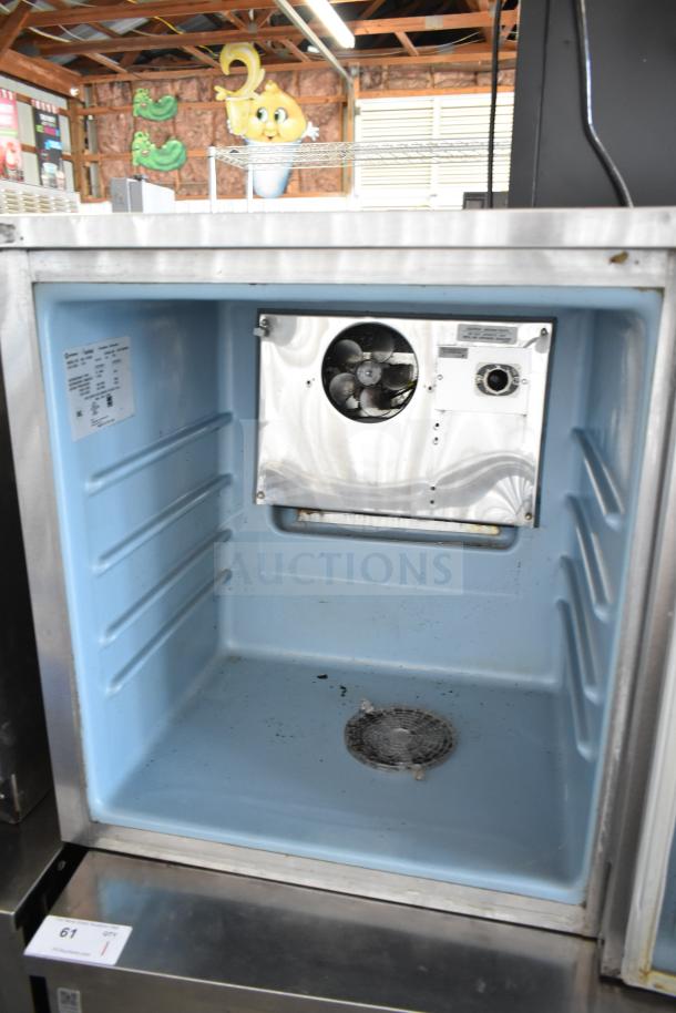 Delfield 406-STAR2 single door undercounter cooler, electric, interior view showing fan and controls, in used condition.