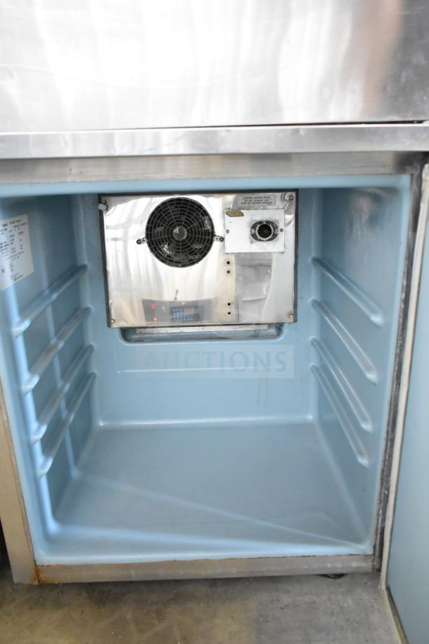 Delfield 406-STAR2 commercial undercounter cooler, single door, interior view, 115 volts, 1 phase, in good condition.