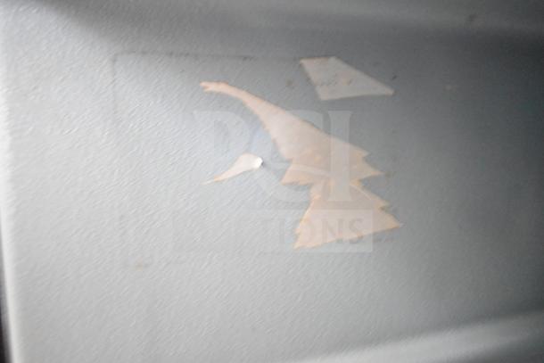 Delfield Commercial 2 Door Undercounter Cooler, 115 Volts, 1 Phase. Visible surface wear, faded exterior.