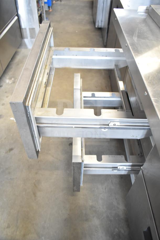 Hoshizaki SR60A-24MD4 commercial prep table with 4 open drawers. Stainless steel, 115V, 1 phase. Used condition.