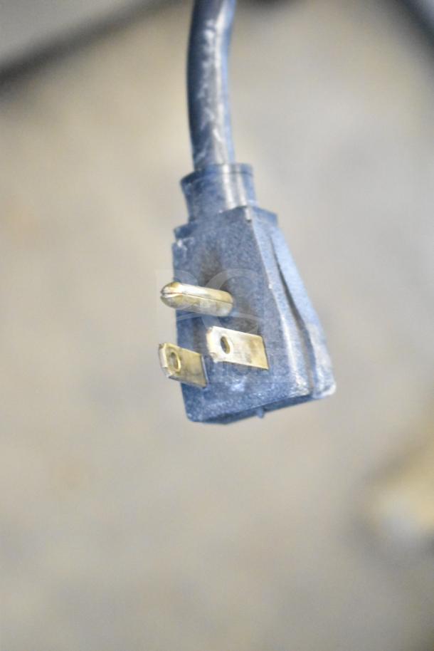 Close-up image of a three-prong electrical plug for the Hoshizaki SR60A-24MD4 commercial prep table.