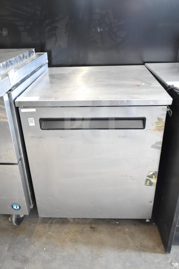 Delfield 406-STAR4 undercounter cooler, single door, stainless steel, 115V, 1 phase, good condition, minor wear marks.