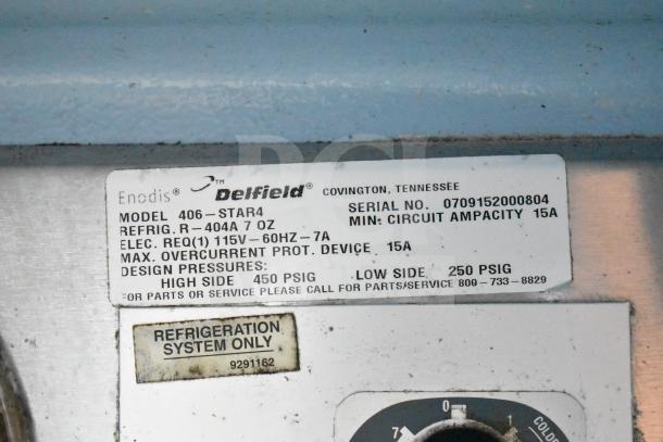 Delfield 406-STAR4 commercial cooler label, showing model, refrigeration specs, electrical requirements, and pressure ratings.