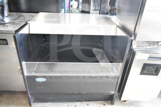 Federal Industries SSRVS3633 36" refrigerated self-serve counter case. Black finish, glass front, 120V, 1 phase, clean condition.