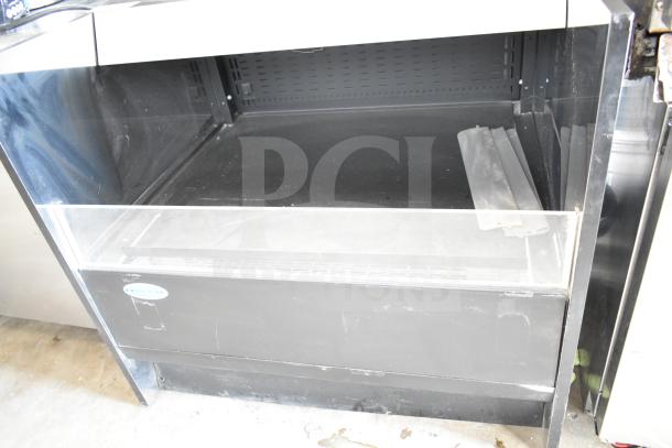 Federal Industries SSRVS3633 36" self-serve refrigerated counter, black exterior, clear front panel, 120V, lightly used.