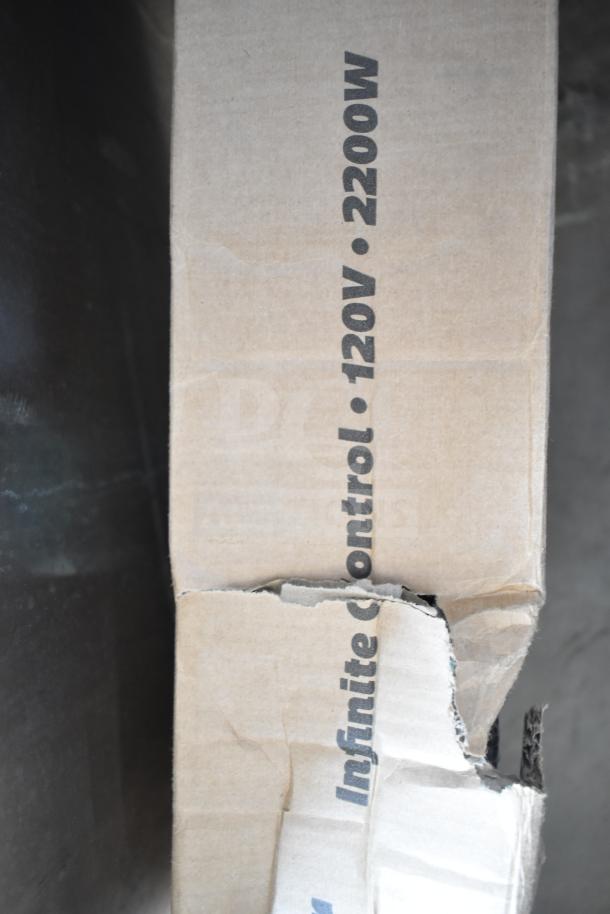 BRAND NEW SCRATCH AND DENT! ServIt 423SW60INHDBLA 60" Double Strip Warmer, 120V, 2,200W, shows box damage, infinite control label visible.