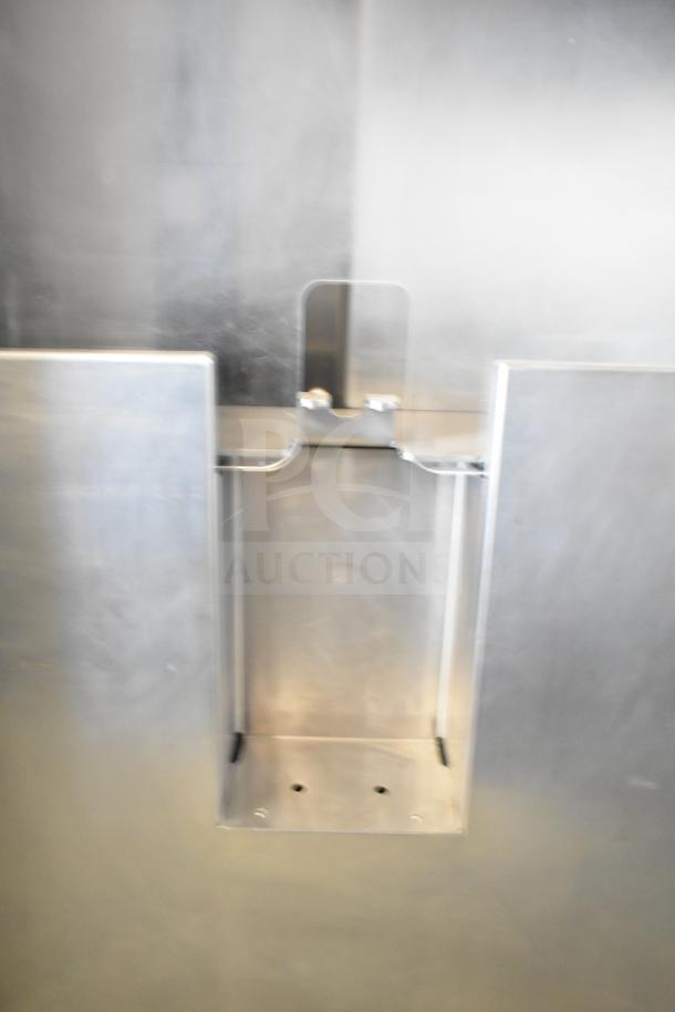 JBT 2ND-GEN-MFJ-HE commercial citrus juicer, stainless steel, floor style, with casters, 115V, 1 phase, sturdy build.