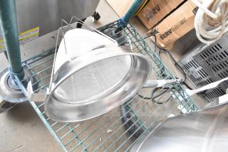 Brand new Galaxy 177GCT10 10" stainless steel bouillon strainer with reinforced frame, minor scratches visible.
