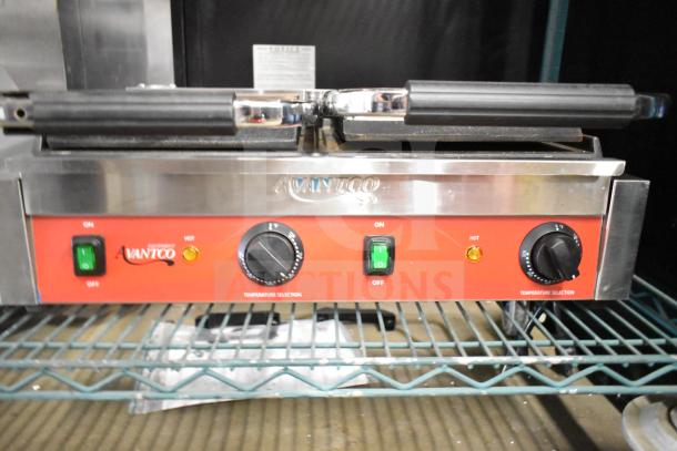 Brand new Avantco 177PG400S commercial dual panini grill, smooth plates, 19 5/8" x 9 1/8" surface, 120V, visible controls.