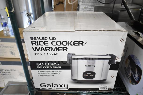 Brand new Galaxy 177GRCS60 electric rice cooker, 60-cup capacity, sealed, 120V, 1 Phase, in box with minor scratches.