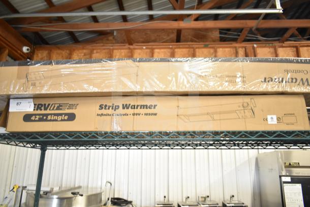 BRAND NEW SCRATCH AND DENT! ServIt 423SWI42 42" Strip Warmer in box, 120V, 1050W, adjustable infinite controls, visible box label.