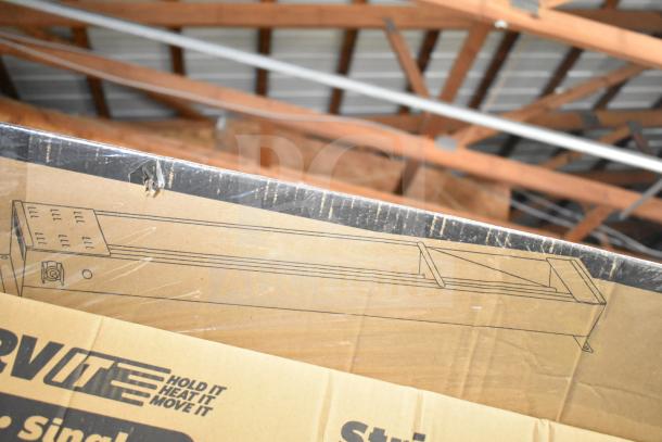 Brand new Avantco 177SW72T 72" high wattage strip warmer, features on/off toggle controls, 120V, in original packaging.