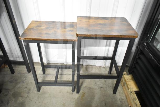 24 wood-pattern tables and bar-height stools with black metal frames. Durable construction, ideal for dining or bar settings. Auctioned in bulk.