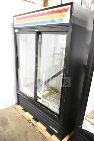 Brand new True GDM-47-HC-LD commercial cooler with minor scratches. 2 glass doors, 115 volts, energy-efficient, black frame.