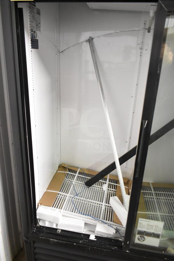 2025 True GDM-47-HC-LD commercial cooler, brand new, visible dents and scratches inside, 115 volts, 1 phase.