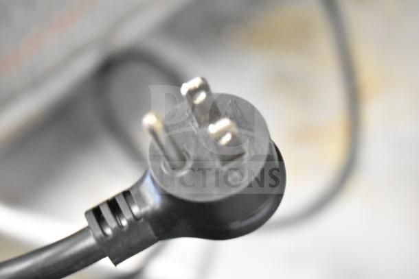 Black power plug for a True GDM-47-HC-LD commercial cooler. Three-prong design, 115 volts, 1 phase compatibility.